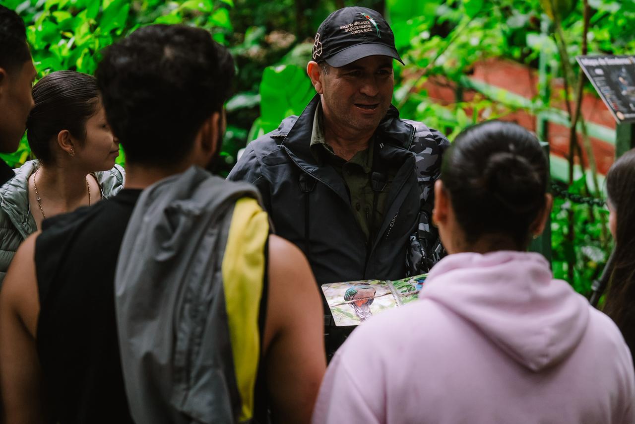 Juan Carlos, naturalist guide, with guests on a tour in Monteverde, Costa Rica